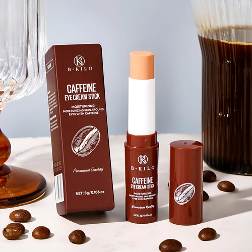 Caffeine Eye Cream Stick in silver and white packaging, showing twist-up applicator with 3g net content.