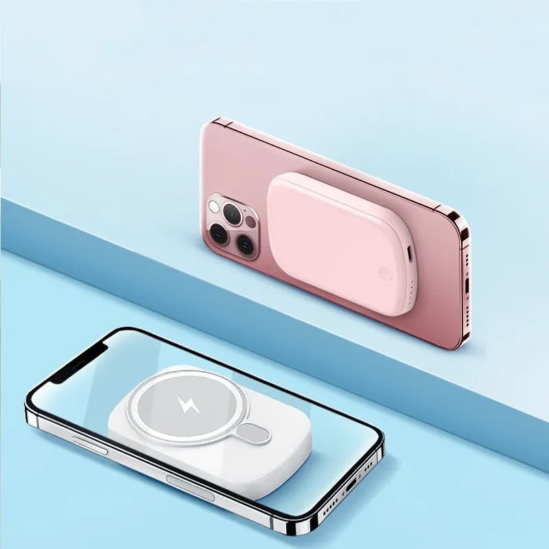 Slim Magsafe magnetic wireless power bank in Barbie Pink, shown next to an iPhone.