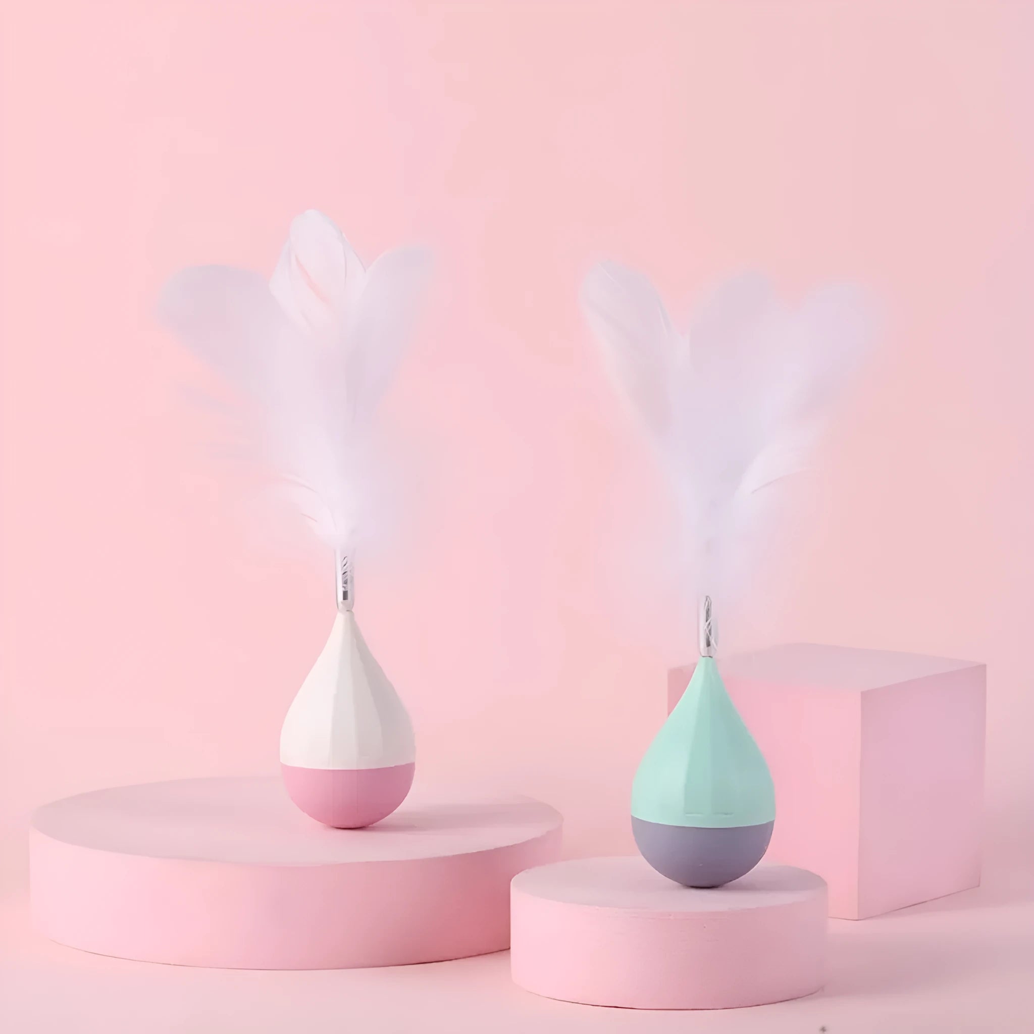 Feather tumbler cat toy with goose feather attachments on aluminium alloy rod and ABS plastic base