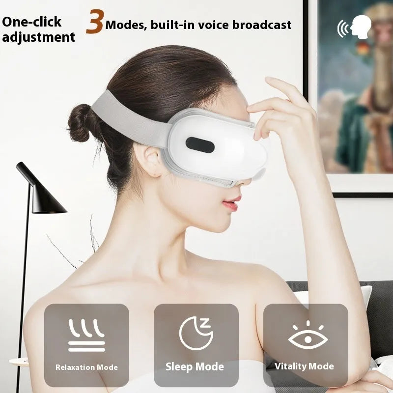 White rechargeable eye massager with airbag massage and hot compress functions for relieving eye fatigue