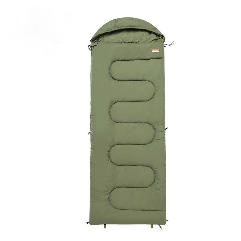 Cotton camping sleeping bag quilt in ochre or olive green colour folded for transport