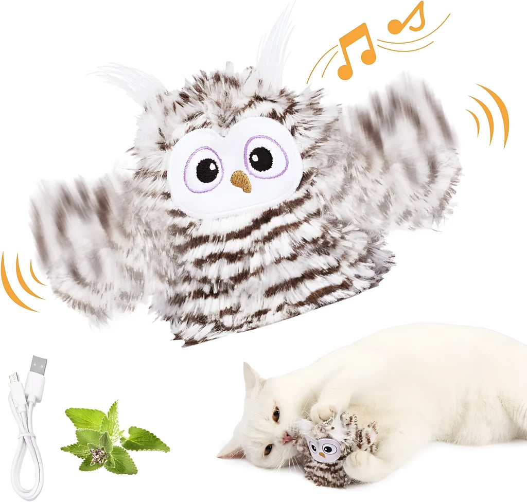 Grey owl-shaped automatic cat toy with flapping wings on charging cable