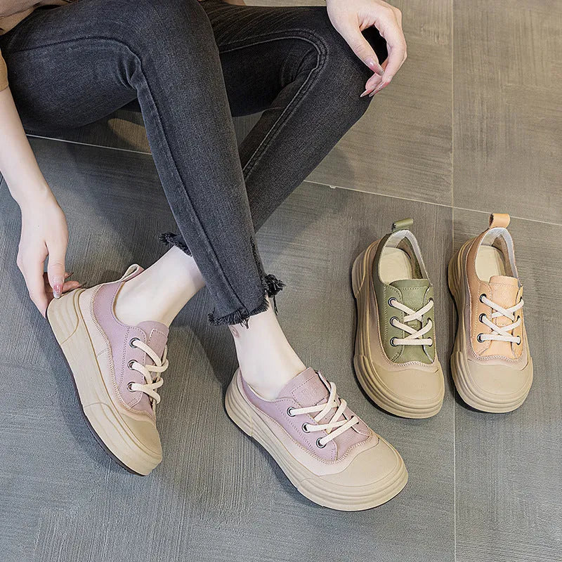 Women's leather low-top platform sneakers in matcha green on a white background.