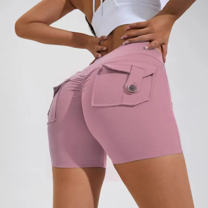 Women's high waist hip lifting sports shorts with side pockets in electric blue colour