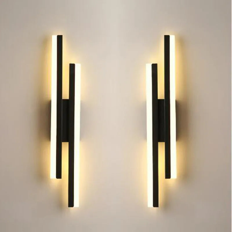 Scandinavian minimalist LED wall light with acrylic lampshade in black or gold finish